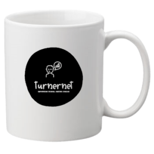 TurnerNet logo on a white coffee mug