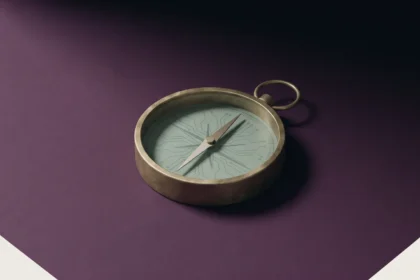 Brass compass with circuit lines etched into its dial, pointing steadily, a metaphor for values guiding technology